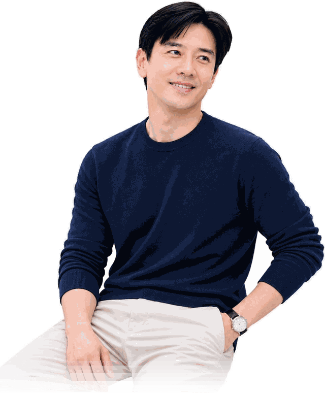 Dato' Seri Ivan Teh seated in a navy sweater, looking to one side